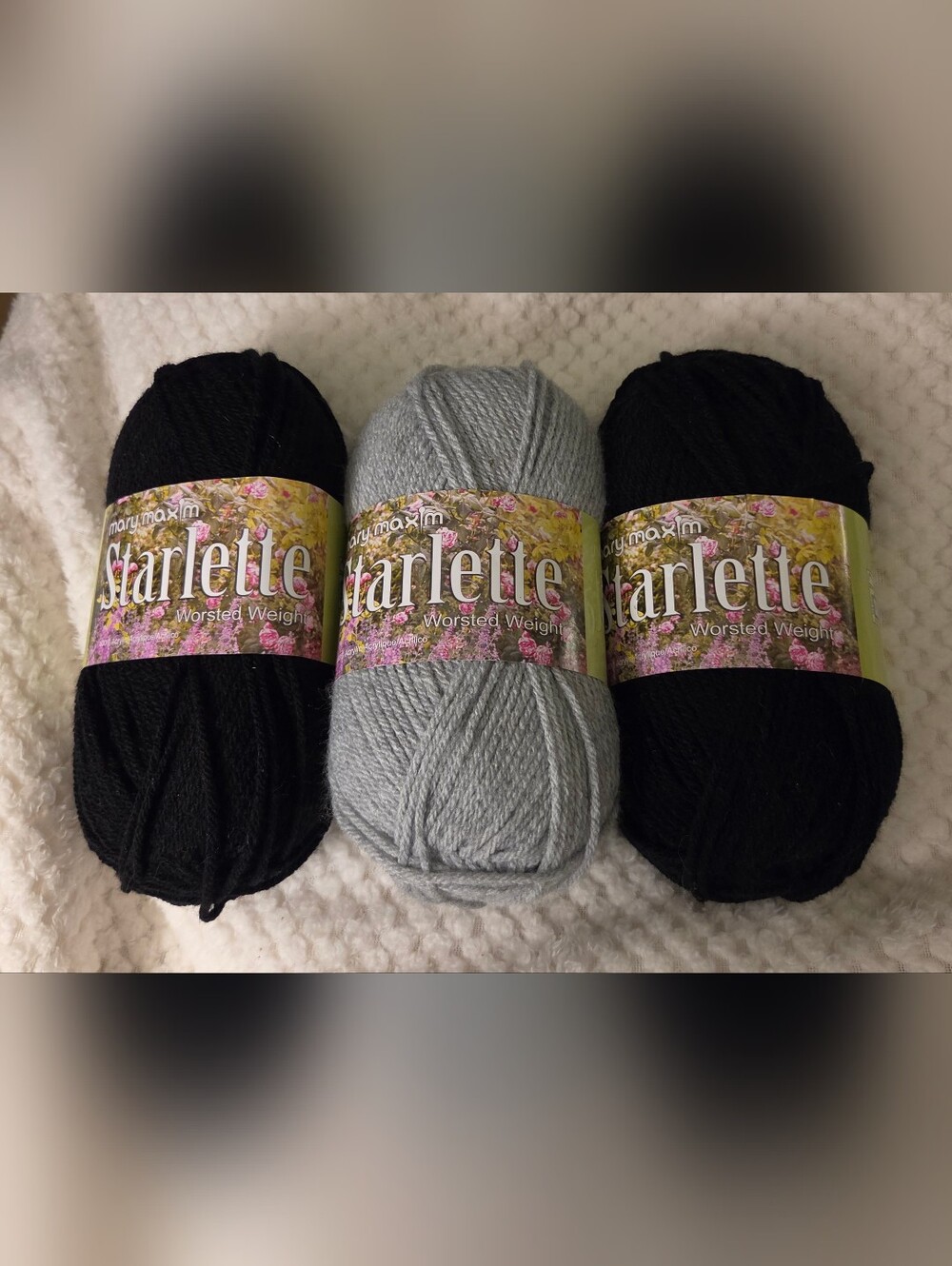 3 SKEINS MARY MAXIM STARLETTE YARN 2 BLK AND 1 LIGHT GRAY